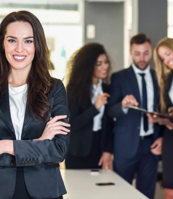 Businesswoman leader in modern office with businesspeople workin